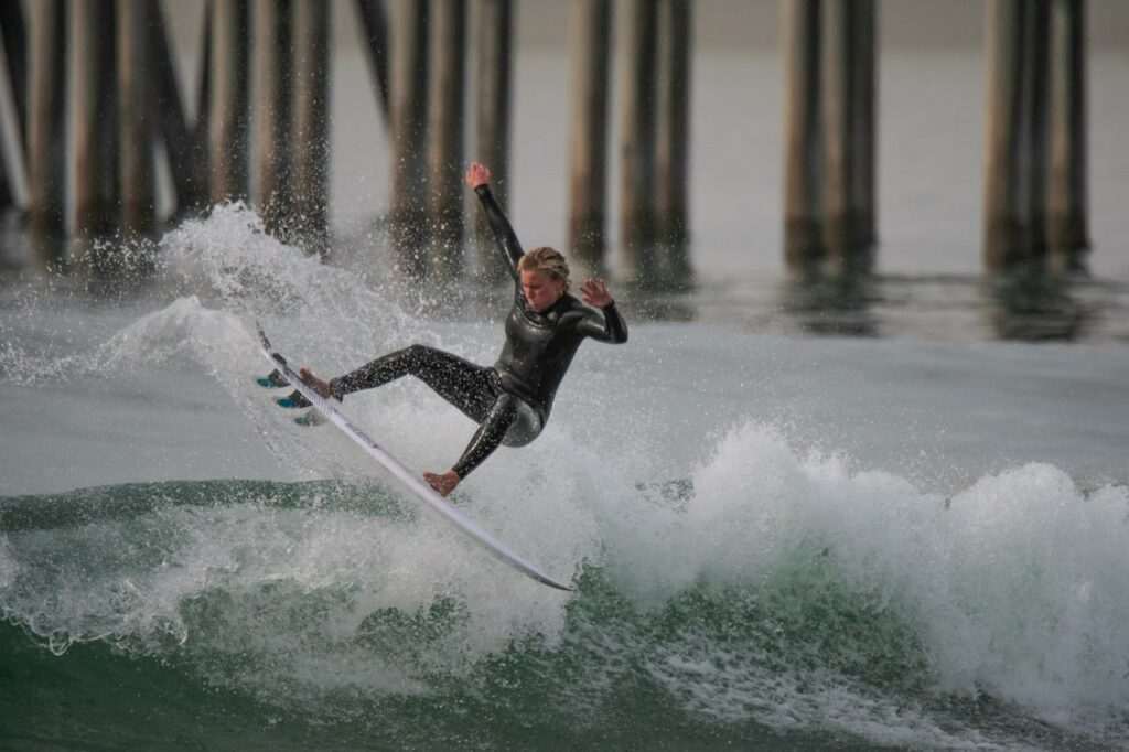 Kaleigh surfing