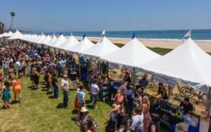 Coast line tents of people tasting wine