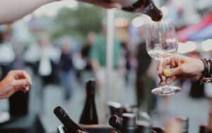 White wine being poured into a glass